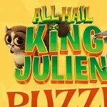 To figurer og tekst på en gul baggrund med grøn og rød skrift, den ene figur er en lemur med en krone