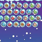En række farverige bobler med forskellige julemotiver på en sneklædt baggrund