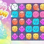 Pastelfarvet illustration af et slot med teksten Cloudy Kingdom ved siden af et gitter med farverige ansigter i forskellige former