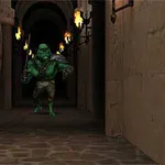 En grøn goblin med et sværd står i en oplyst stenkorridor med fakler på væggene