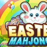 På billedet ses et tegneseriekaninansigt over teksten Easter Mahjongg med påskeæg, en regnbue og balloner i baggrunden