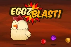 En tegneseriekylling står foran farverige kugler med teksten EGGZ BLAST!
