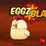En tegneseriekylling står foran farverige kugler med teksten EGGZ BLAST!