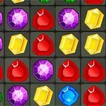 Farverige perler og ædelsten i forskellige former er arrangeret i et gittermønster