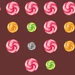 Farverige spiralformede slikikoner er arrangeret i rækker på en brun baggrund med en ternet kant