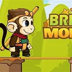En tegneseriemønt er klædt i eventyrdragt, der står på en platform med teksten Bridge Monkey i baggrunden