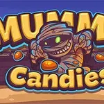 Animeret mumie med slik omgivet af teksten Mummy Candies på en stiliseret baggrund