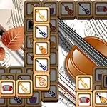 Brikker med musikalske symboler over en violin og noder