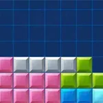 Farvede blokke arrangeret på en blå grid-baggrund