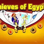 Spillekort og guldmønter på en gylden baggrund med titlen Thieves of Egypt