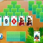 Kortspil med flere dæk kort og en joker ved siden af en pauseknap