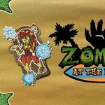 Tegning af en zombie i hawaiiansk skørt med snefnug, med sorte palmer og teksten Zombies at the Beach mod en brun baggrund